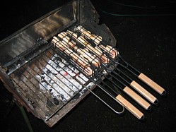 Barbecue grilled salmon in a fish basket