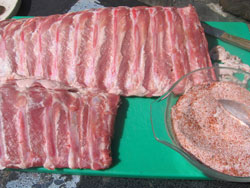 Applying rub to ribs Applying rub to ribs