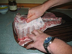 Removing the membrane from BBQ ribs