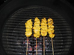 Slow Grilling Chicken Tikka Kabobs Over Medium Coals