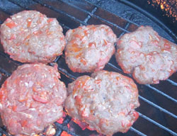 Chorizo grilled burgers cooking.
