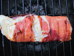 Grilled halibut wrapped in Serrano ham