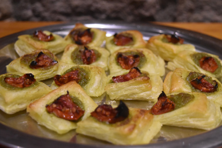 Sun blush tomato and pesto puff pastry bites