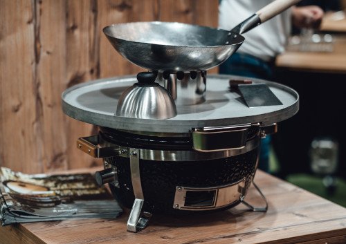 Monolith Icon With Fire Plate & Wok Stand Differentiates It From Big Green Egg MiniMax.