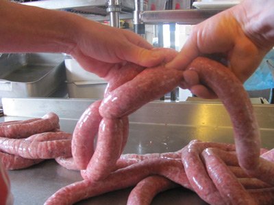 Making homemade breakfast sausage links