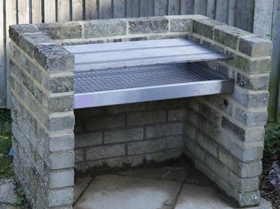 Our step by step guide will help you build a brick BBQ grill like this one