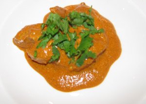 Indian Butter Chicken Garnished With Chopped Coriander (Cilantro)