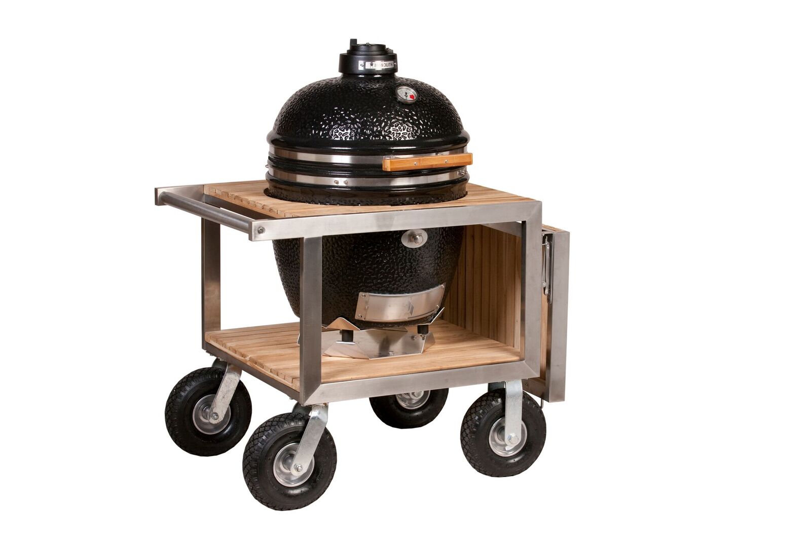 The Monolith ceramic grill in the stainless steel framed buggy with folding side shelf