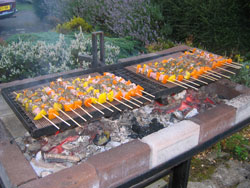 You can build a brick BBQ using a car jack and a sewing machine stand