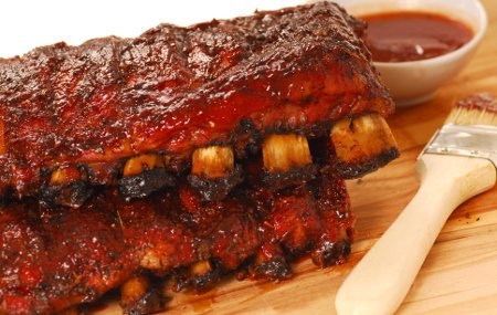 Homemade BBQ sauce mopped over ribs