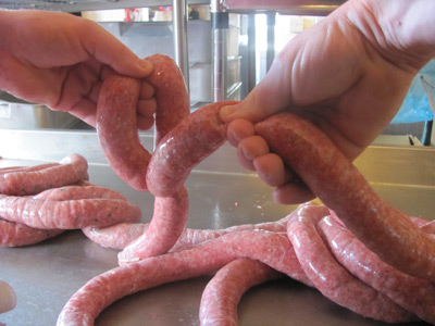 Nip to create your first three sausage links