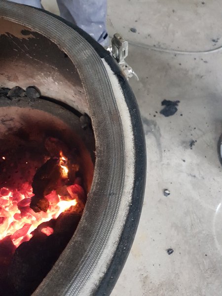 The problem with the Kamado Joe gasket is that it comes unstuck at higher temperatures