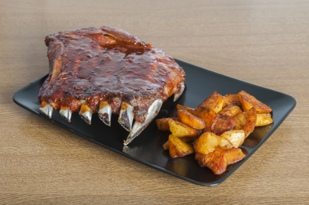 Oven barbecue ribs with fried potatoes