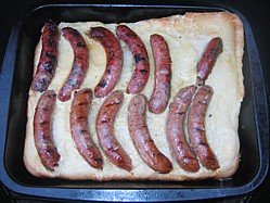 Toad in the hole is a good example how to cook sausage in the oven.